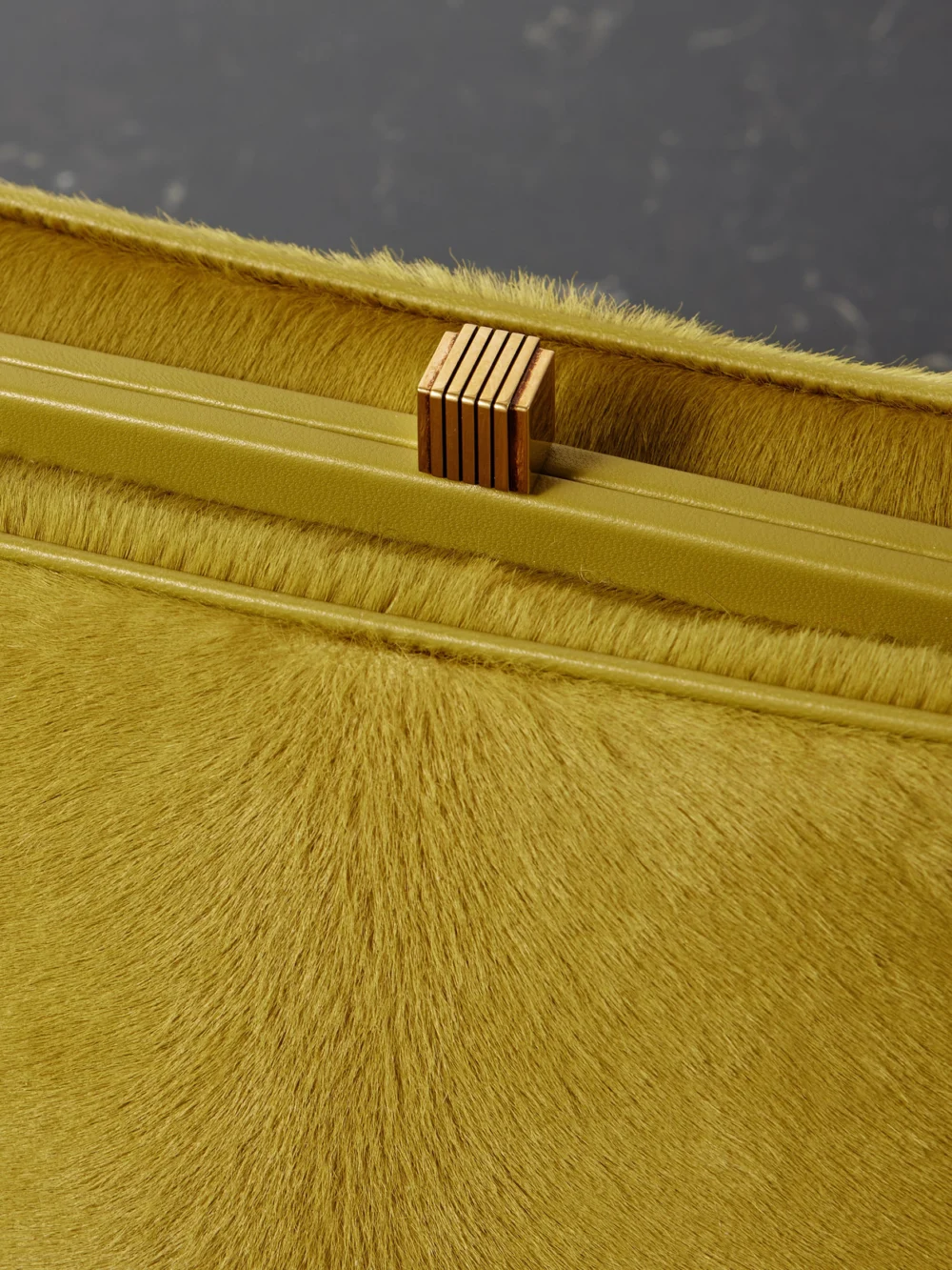 Close-up detail of the Khaite Cate Leather-trimmed Calf Hair Tote