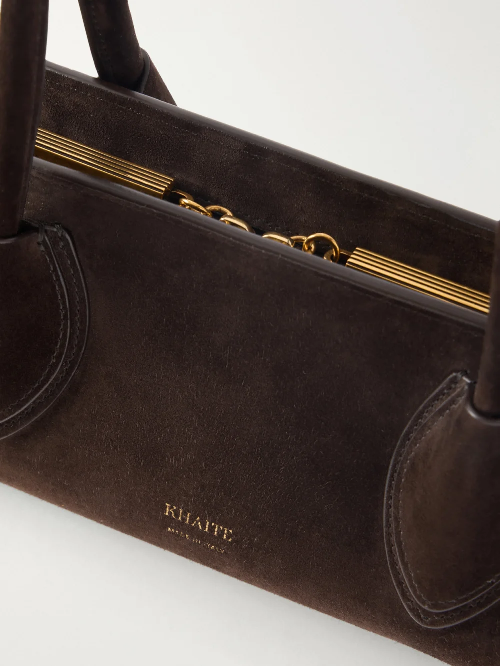 Close-up detail of the Khaite Donna Suede Shoulder Bag