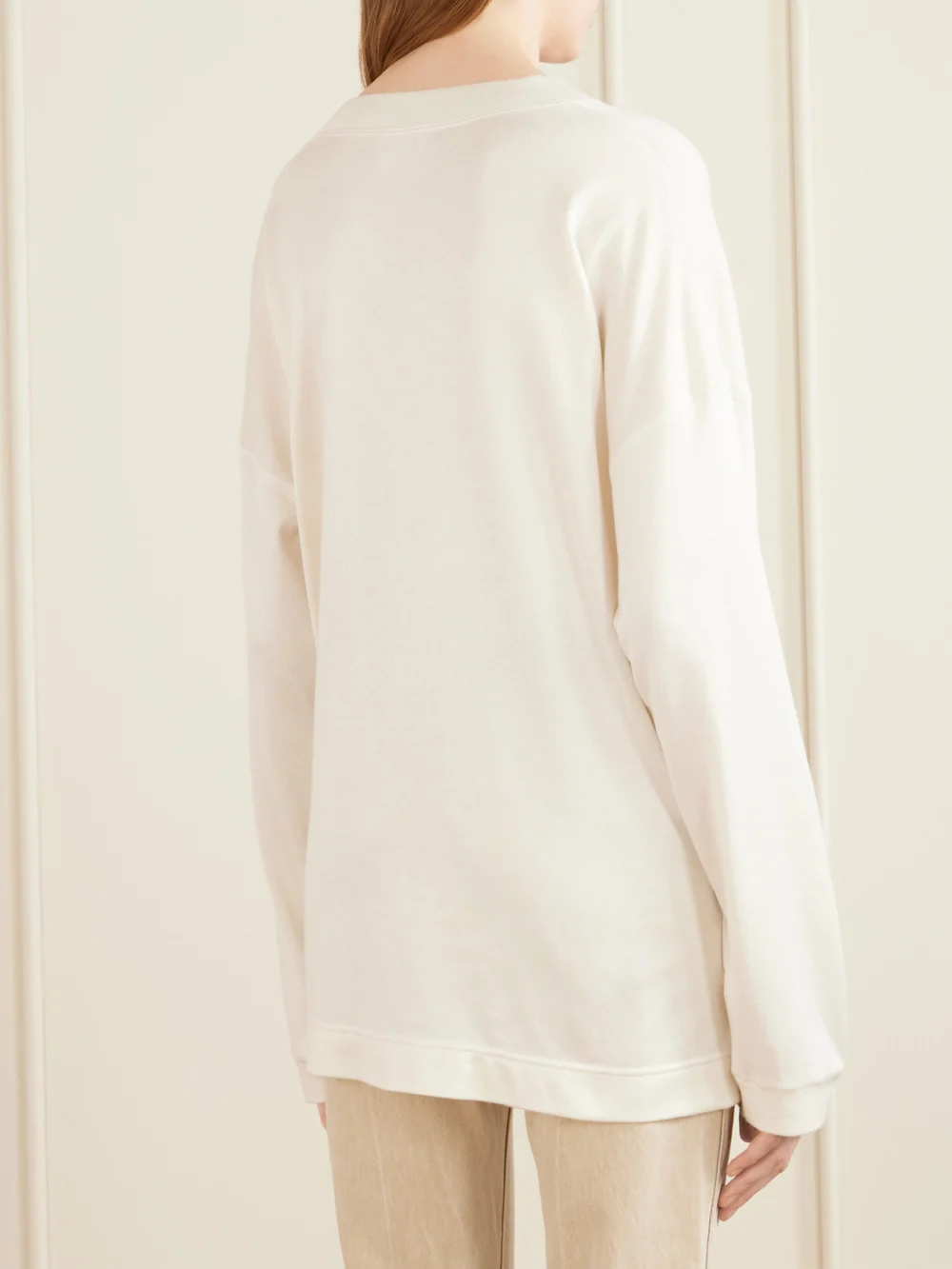 Back view of the Khaite Dylan Silk Sweatshirt