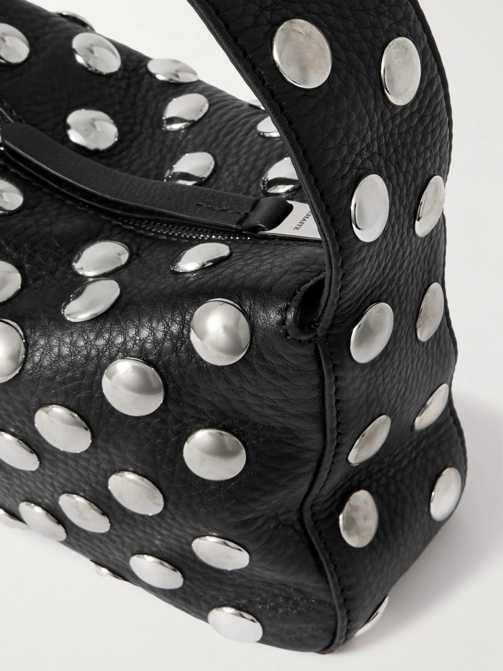 Close-up detail of the Khaite Elena Small Studded Textured-leather Shoulder Bag