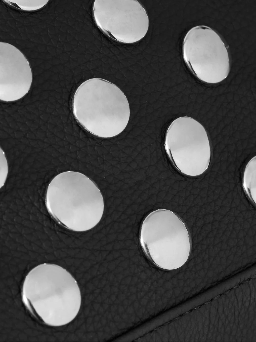 Close-up detail of the Khaite Elena Studded Textured-leather Shoulder Bag