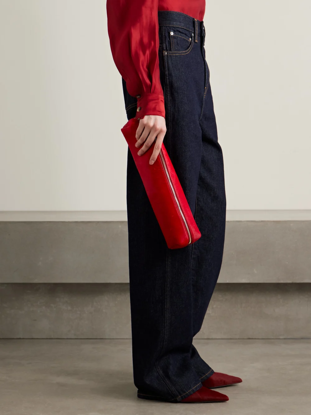 Khaite Kye Calf Hair Clutch, styled view