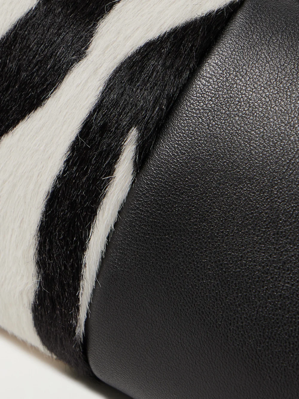 Close-up detail of the Khaite Kye Zebra-print Calf Hair and Leather Shoulder Bag