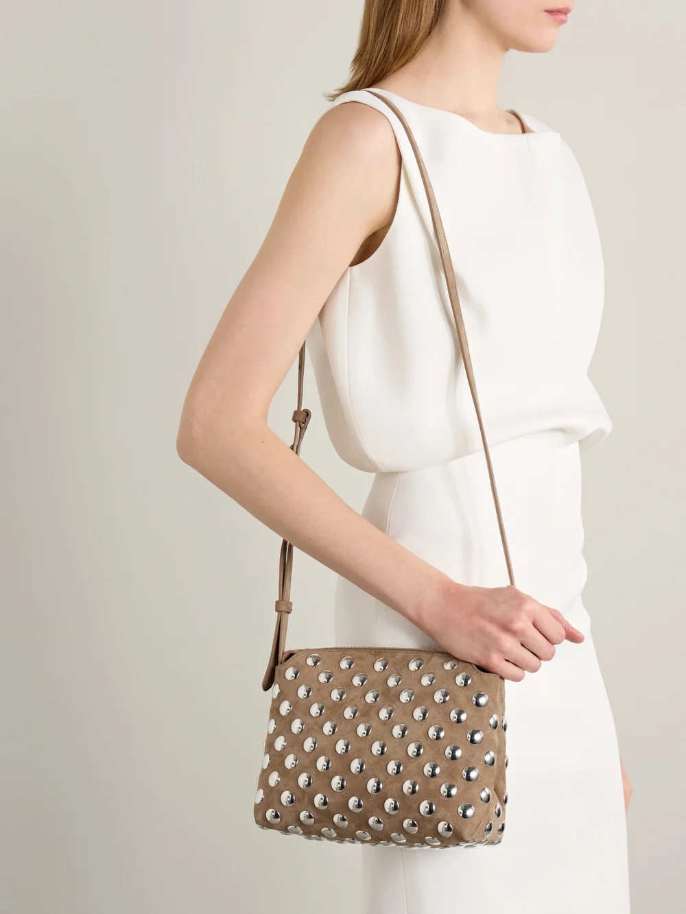 Khaite Lina Medium Studded Suede Shoulder Bag, styled view