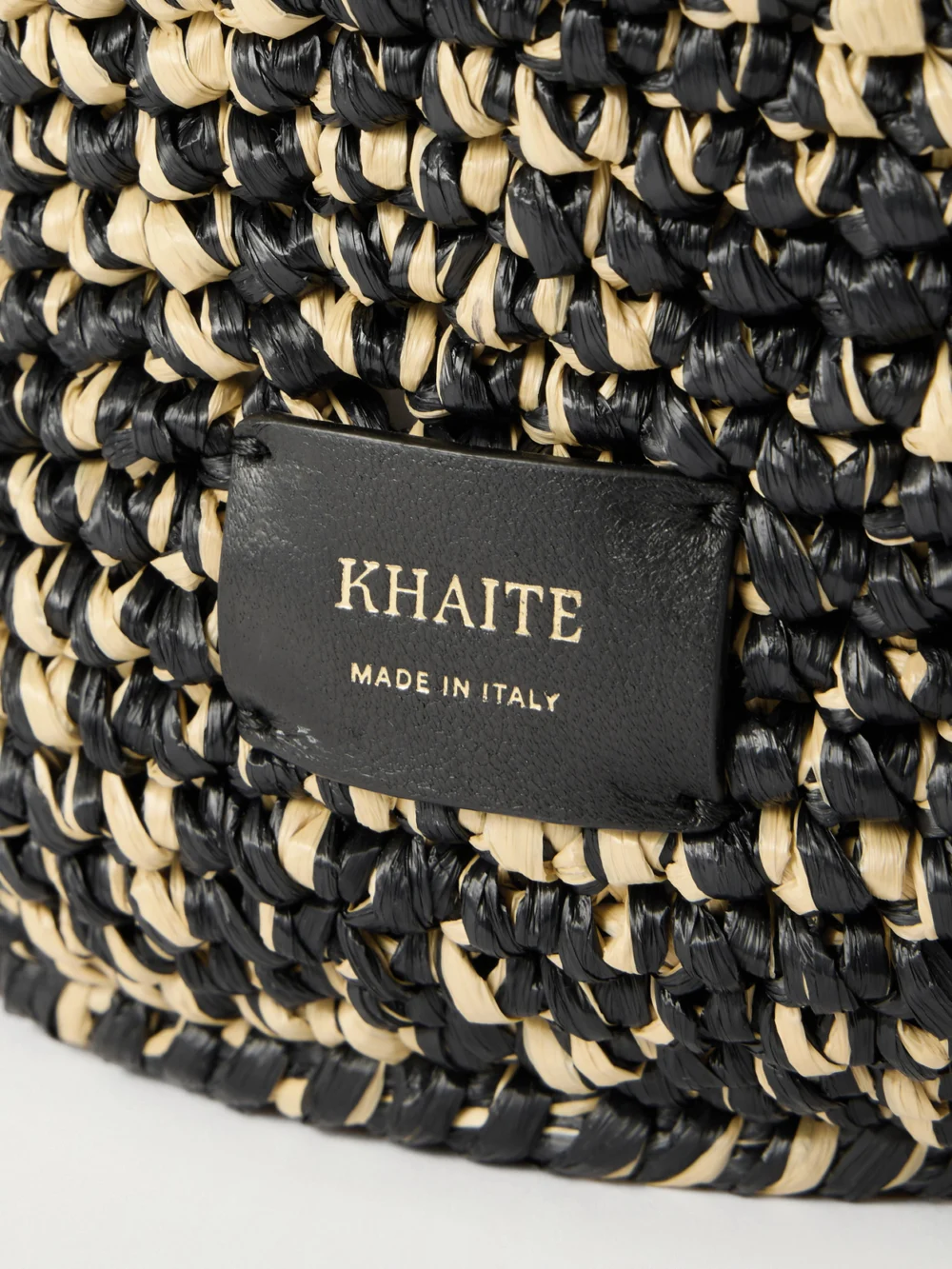 Close-up detail of the Khaite Lotus Medium Two-tone Woven Tote
