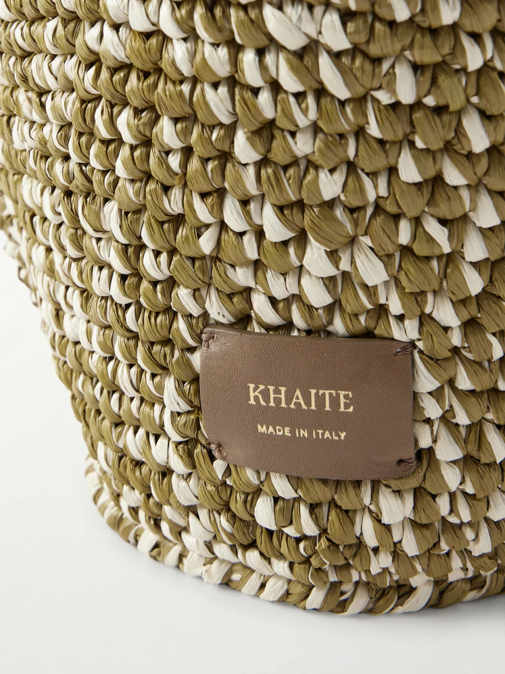Close-up detail of the Khaite Lotus Mini Woven Tote