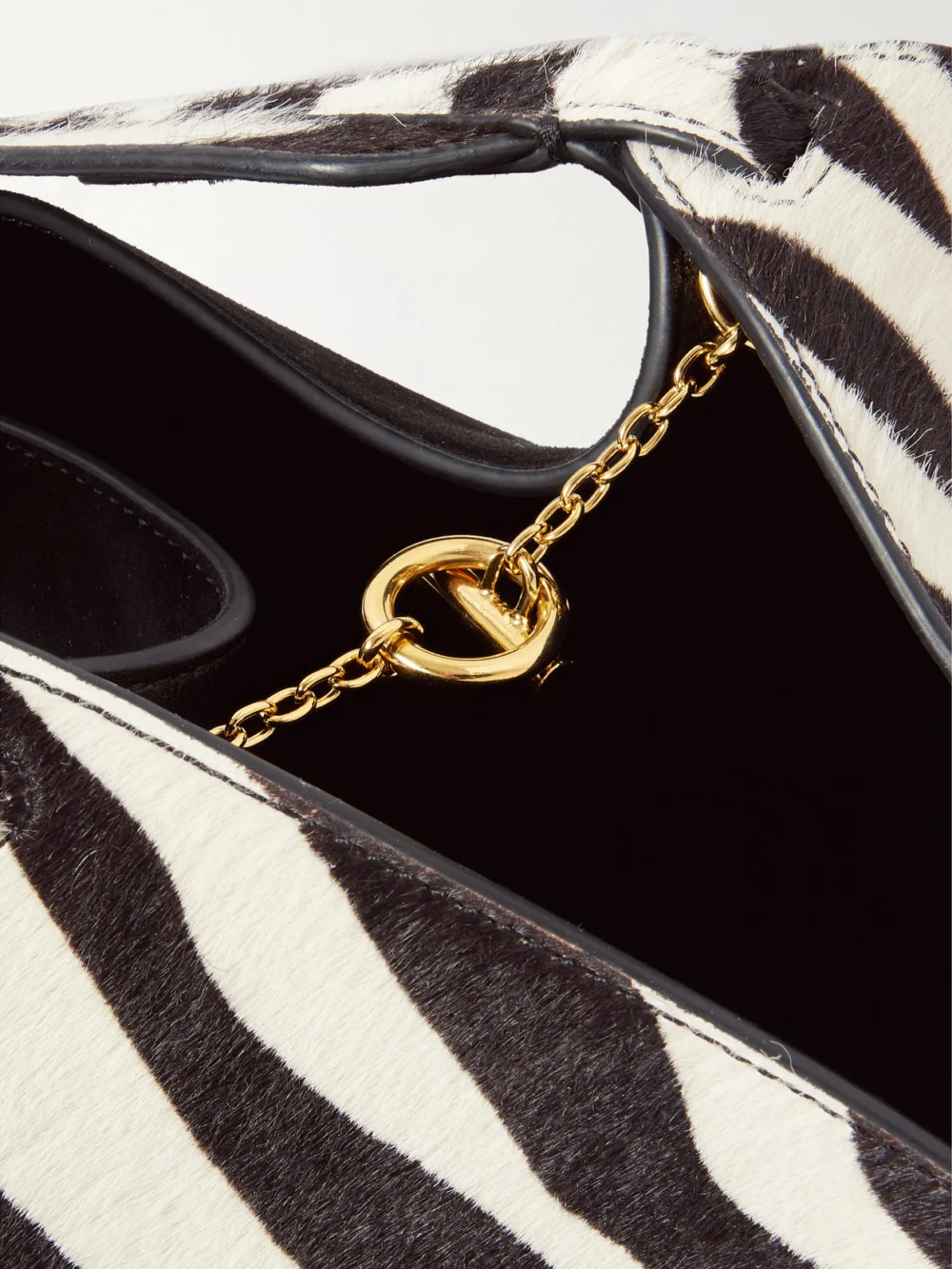 Close-up detail of the Khaite Lotus Mini Zebra-print Calf Hair and Suede Tote