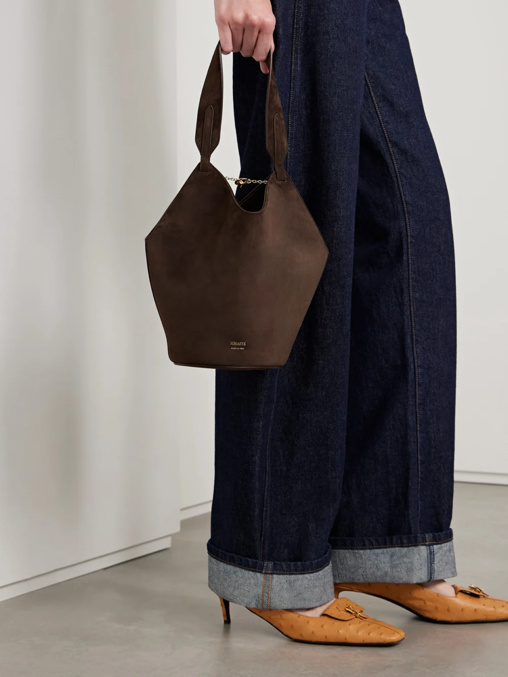 Khaite Lotus Small Suede Tote, styled view