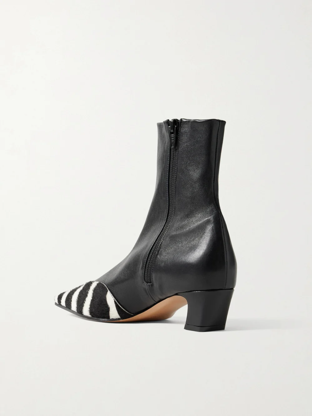 Back view of the Khaite Nevada Leather and Zebra-print Calf Hair Ankle Boots