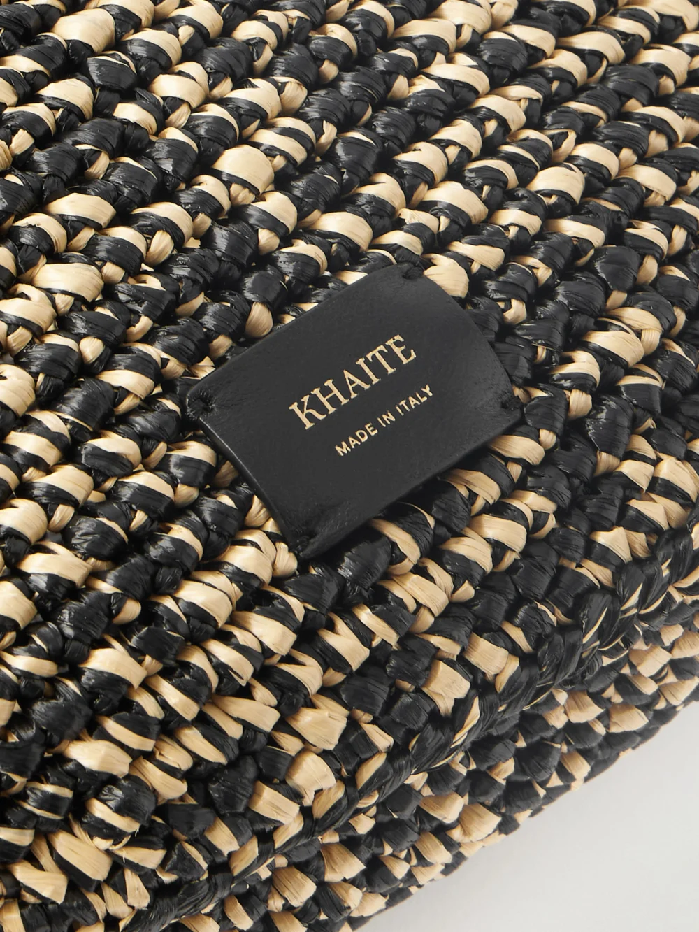 Close-up detail of the Khaite Olivia Medium Woven Top-handle Bag