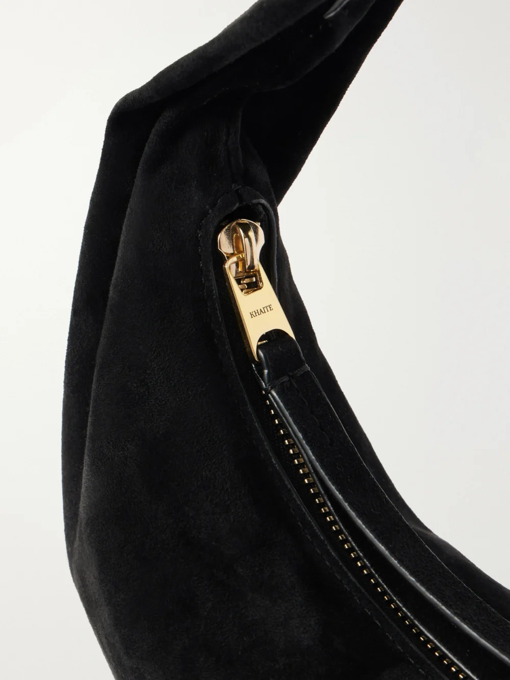 Close-up detail of the Khaite Olivia Mini Suede Top-handle Bag