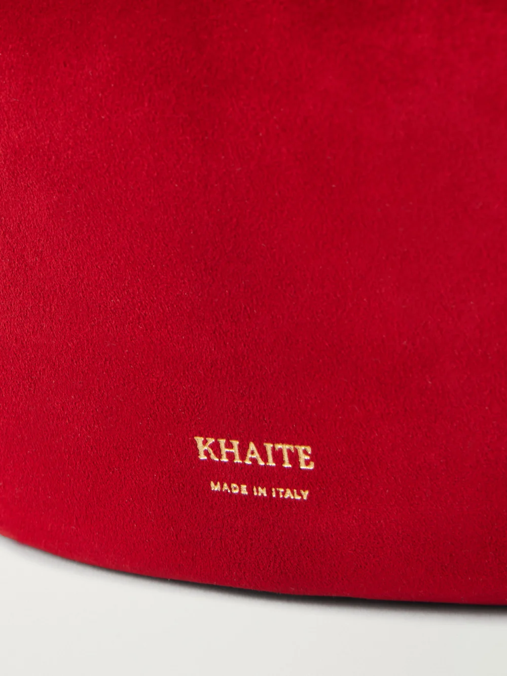 Close-up detail of the Khaite Olivia Mini Suede Top-handle Bag