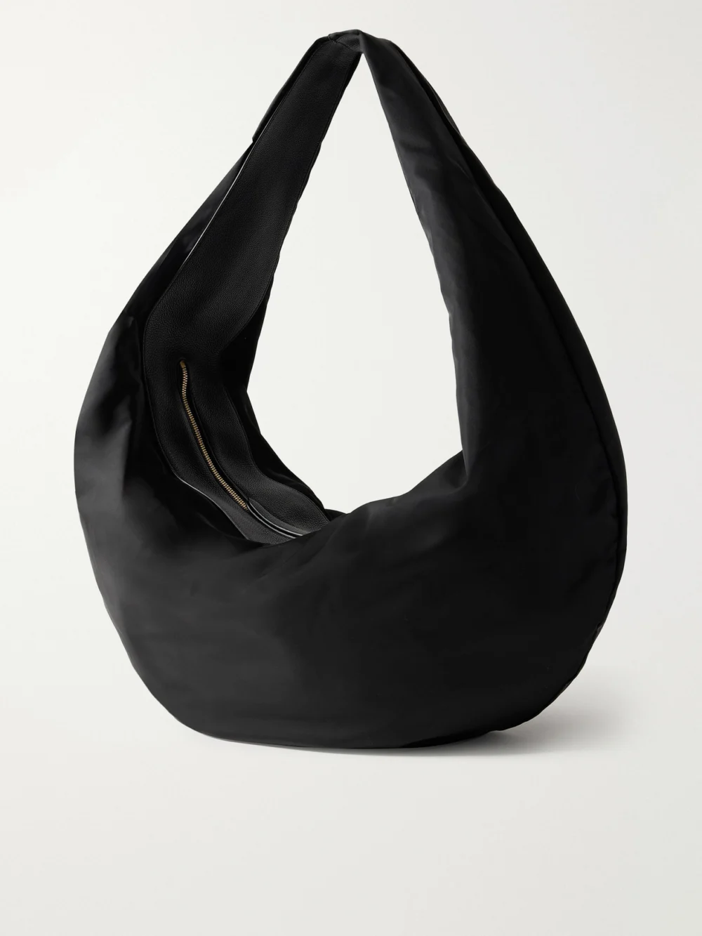 Back view of the Khaite Olivia Sport Xl Textured Leather-trimmed Shell Shoulder Bag