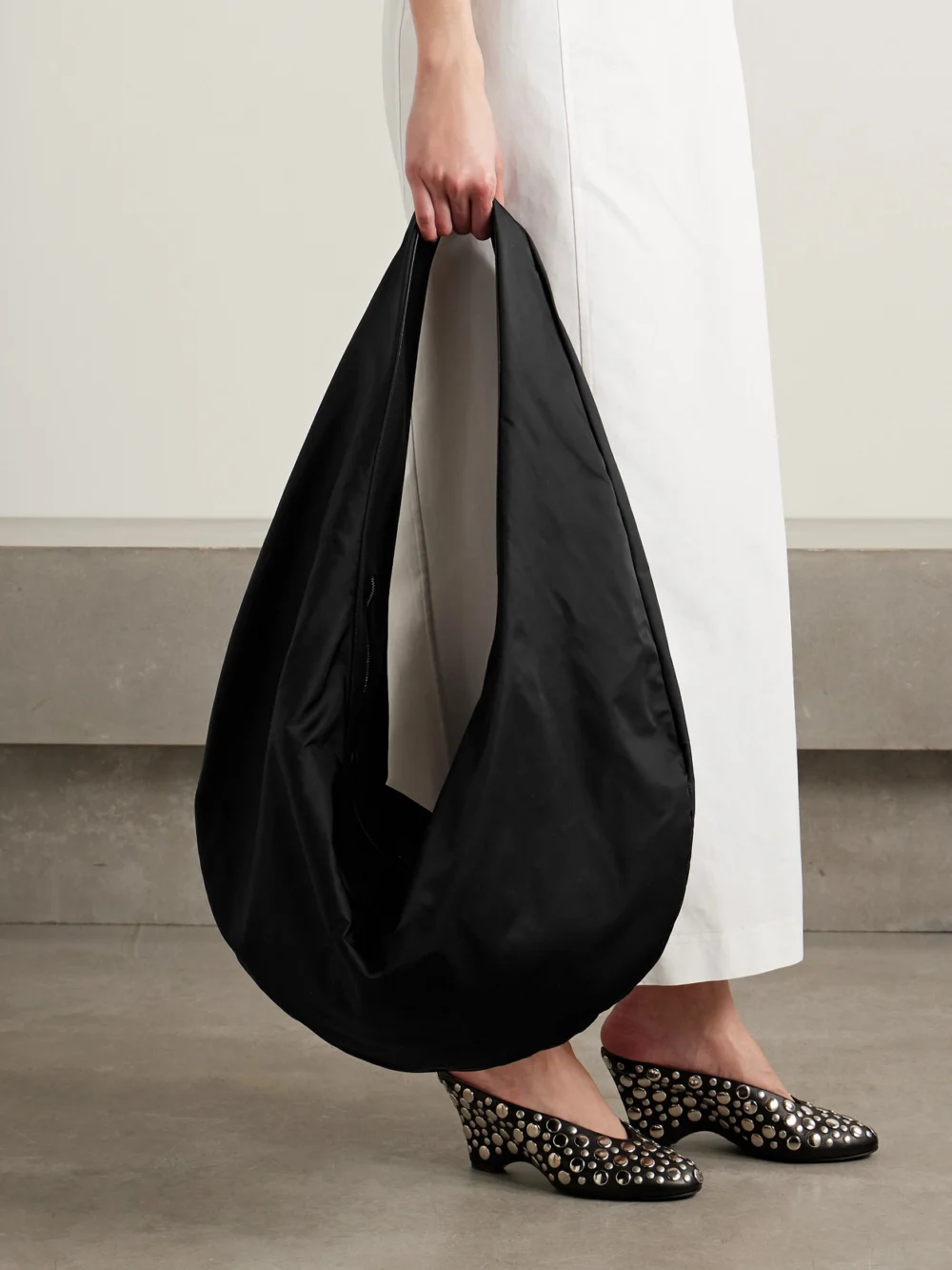 Khaite Olivia Sport Xl Textured Leather-trimmed Shell Shoulder Bag, styled view