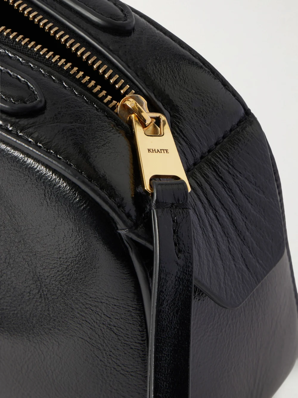 Close-up detail of the Khaite Simona Glossed-leather Shoulder Bag