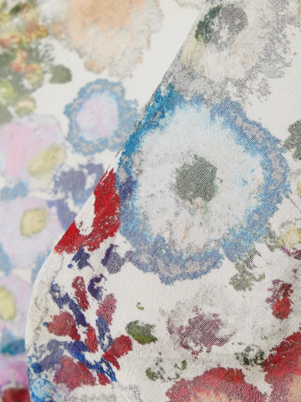 Close-up detail of the Khaite Talita Floral-print Silk-chiffon Triangle Bra