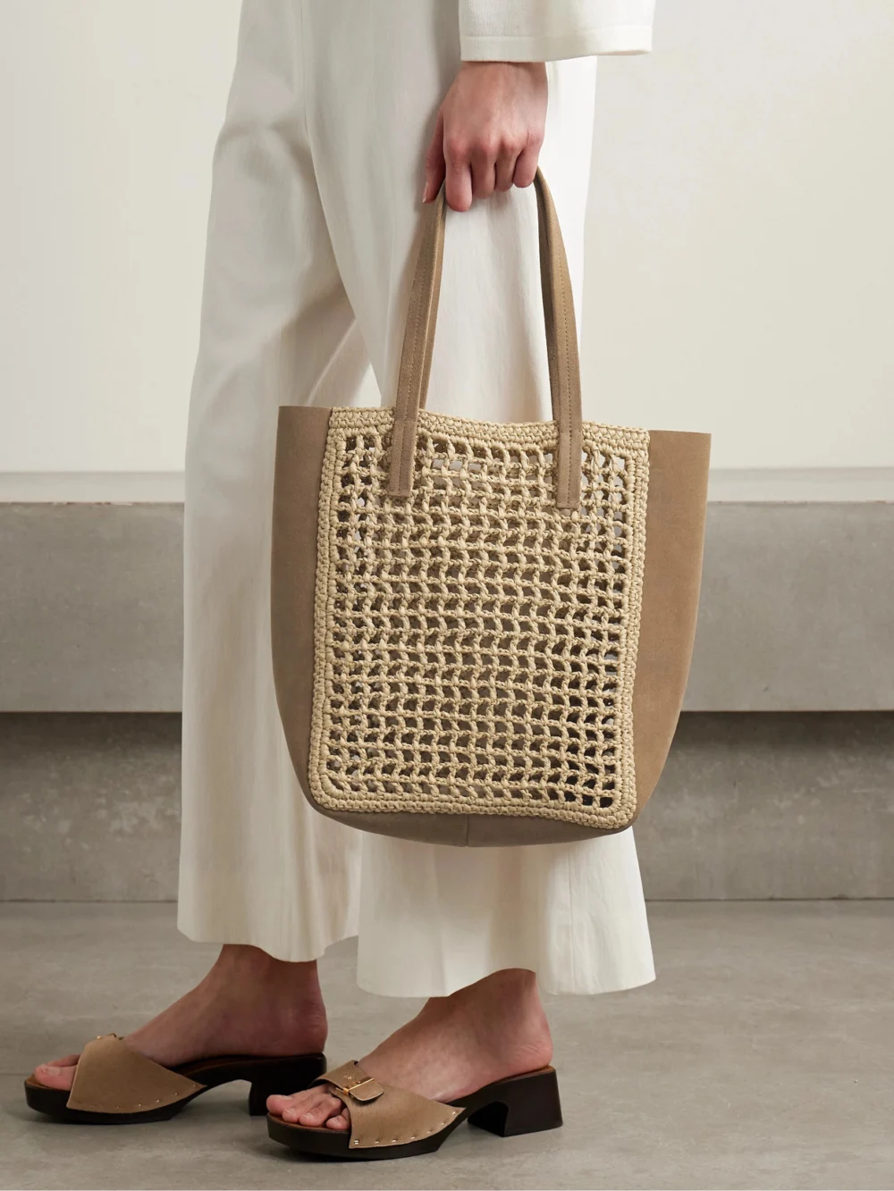 Khaite Zoe Small Suede and Crocheted Raffia Tote, styled view