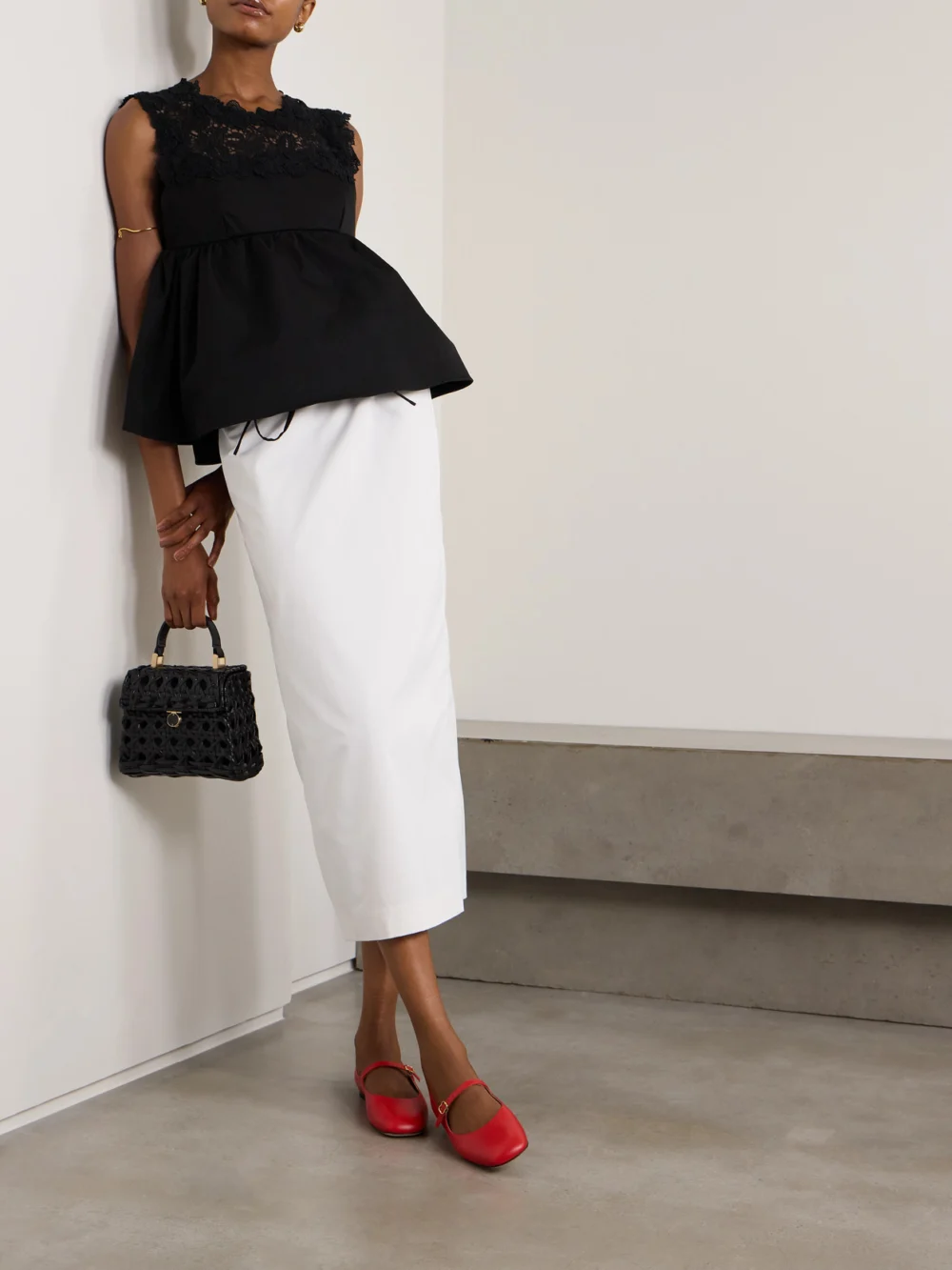 Kika Vargas Ivonne Guipure Lace-trimmed Twill Peplum Top, worn by a model