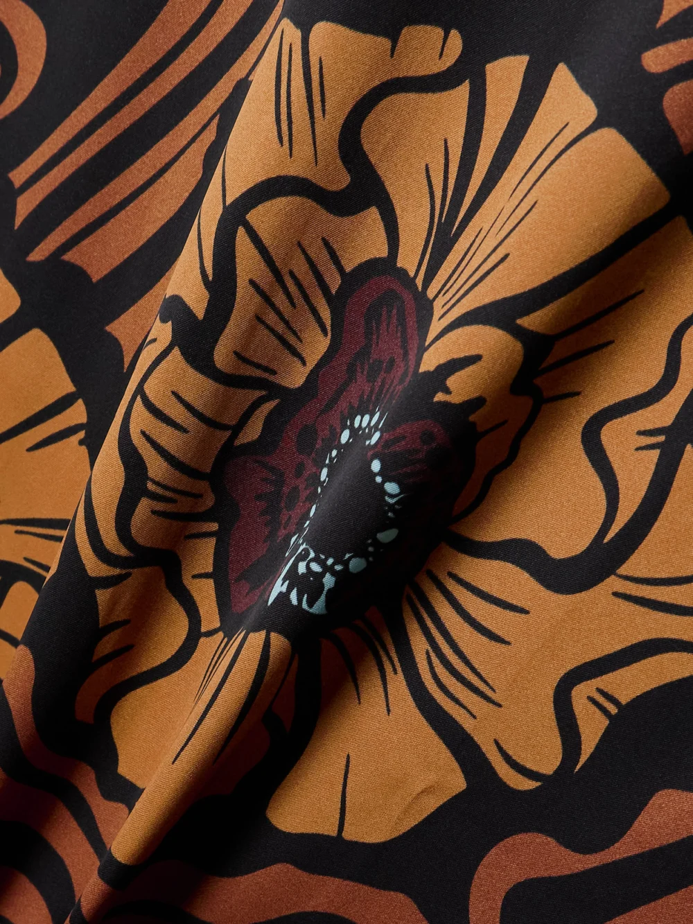Close-up detail of the La DoubleJ Icon Clingy Swing Floral-print Satin Midi Dress