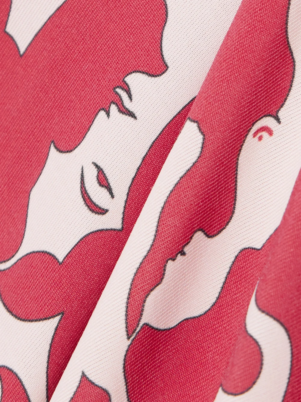 Close-up detail of the La DoubleJ + Mother Twist-front Printed Jersey Midi Dress