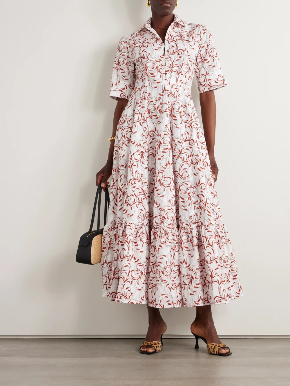 La DoubleJ San Pietro Tiered Embroidered Voile Maxi Shirt Dress, worn by a model