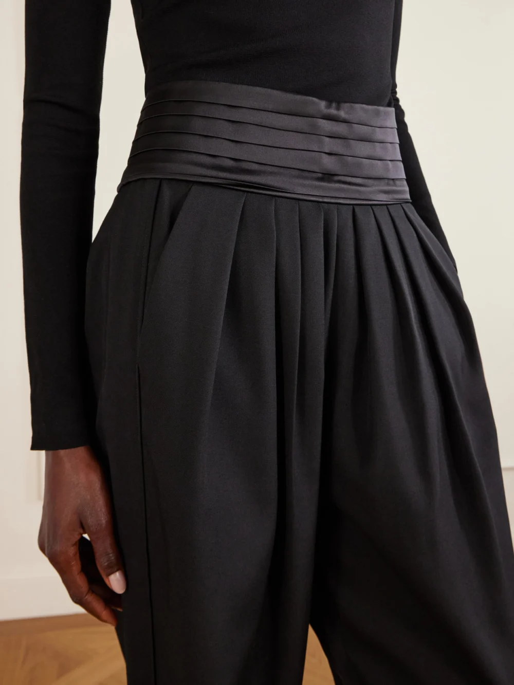 Close-up detail of the Lanvin Pleated Charmeuse and Draped Wool Tapered Pants