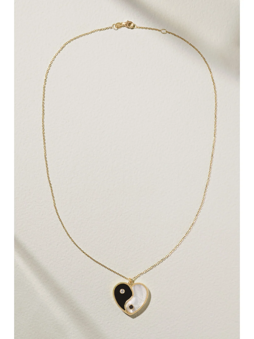 Close-up detail of the L'Atelier Nawbar Yin Yang 18-karat Gold Multi-stone Necklace