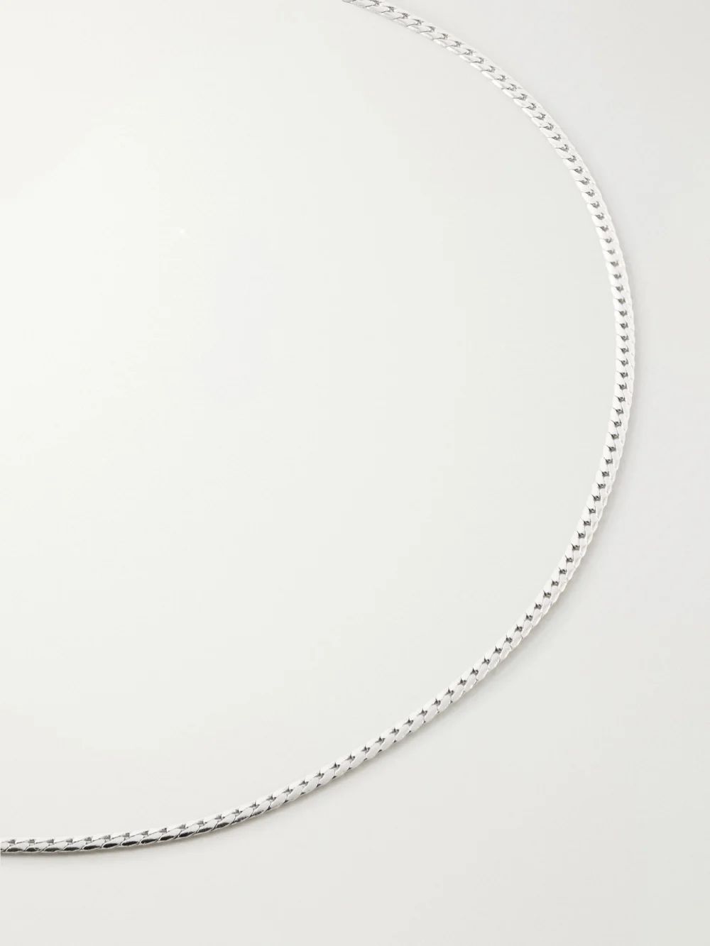 Close-up detail of the Laura Lombardi Mini Omega Platinum-plated Necklace