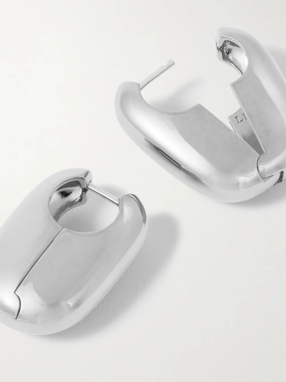 Close-up detail of the Laura Lombardi Vola Rhodium-plated Hoop Earrings