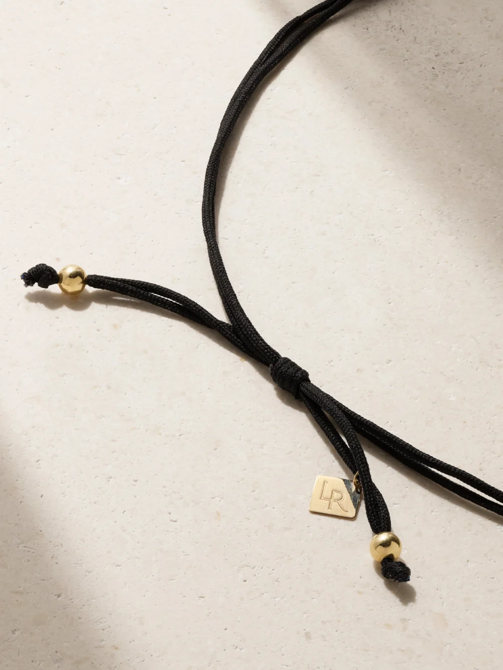 Back view of the Lauren Rubinski 14-karat Gold and Cord Necklace