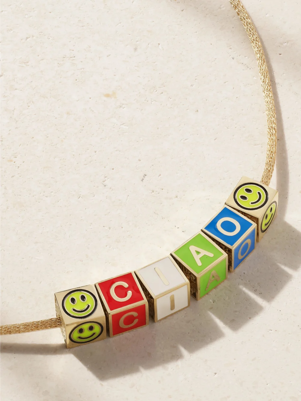 Close-up detail of the Lauren Rubinski Ciao 14-karat Gold and Enamel Necklace
