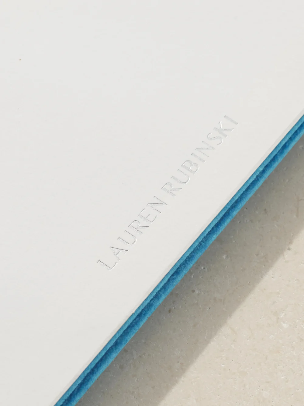 Close-up detail of the Lauren Rubinski Faux Suede Jewelry Tray