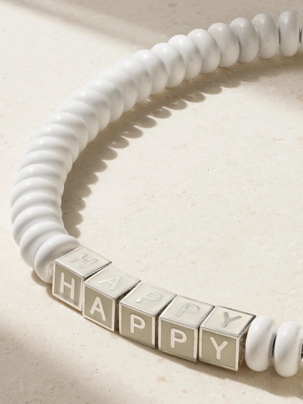 Close-up detail of the Lauren Rubinski Happy Sterling Silver, Enamel and Bead Necklace