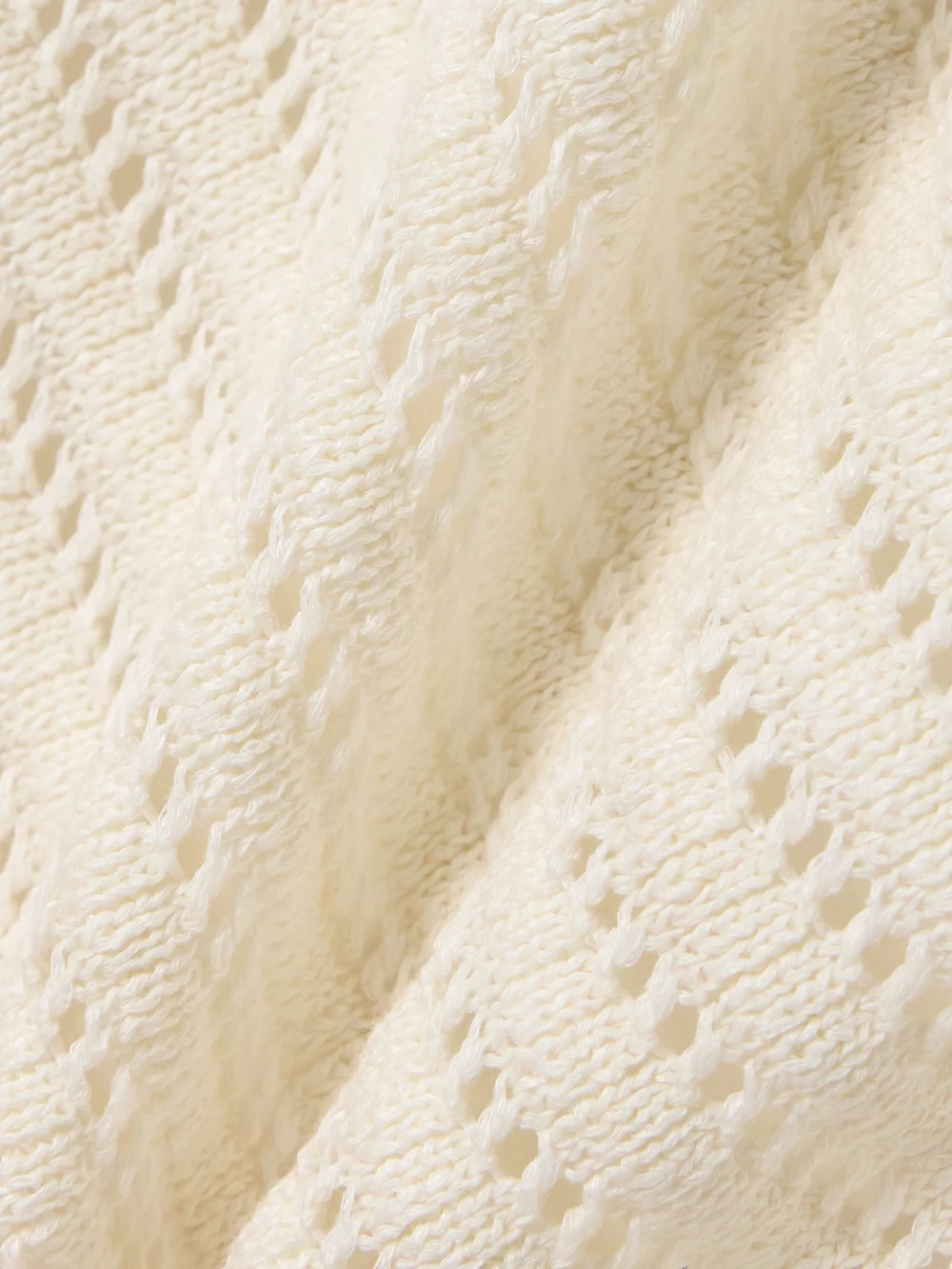 Close-up detail of the Le Kasha Dakhal Organic Linen Playsuit