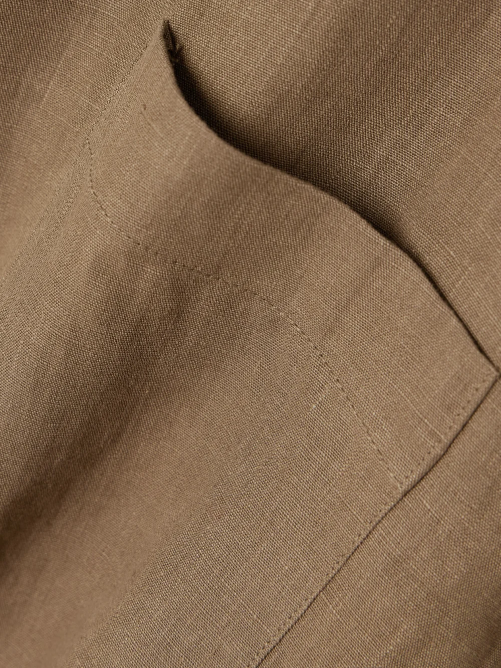 Close-up detail of the Le Kasha Faiyum Linen Shirt