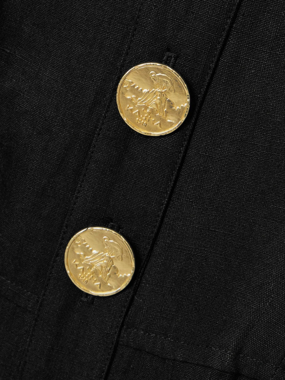 Close-up detail of the Le Kasha Jesmah Open-back Linen Halterneck Midi Dress
