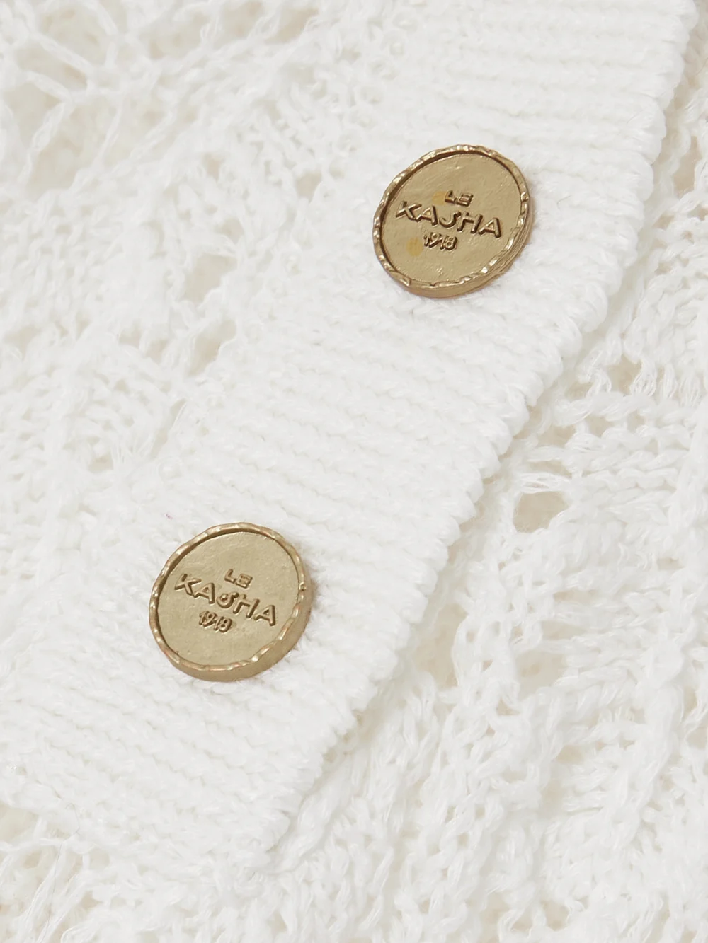 Close-up detail of the Le Kasha Qarar Open-knit Organic Linen Polo Shirt