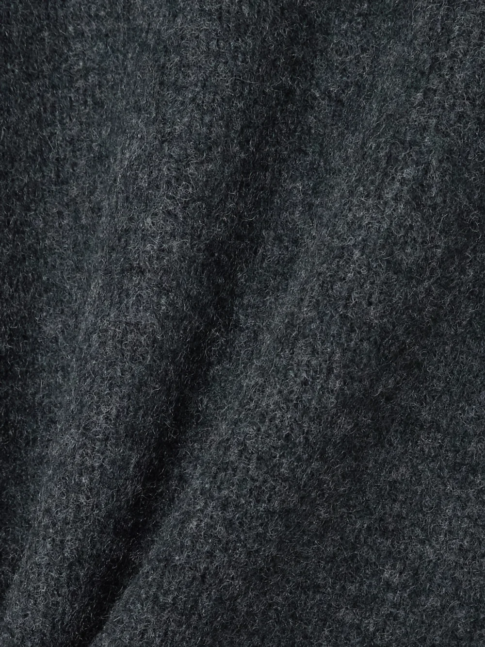 Close-up detail of the Le Kasha Spain Scarf-effect Organic Cashmere Cardigan