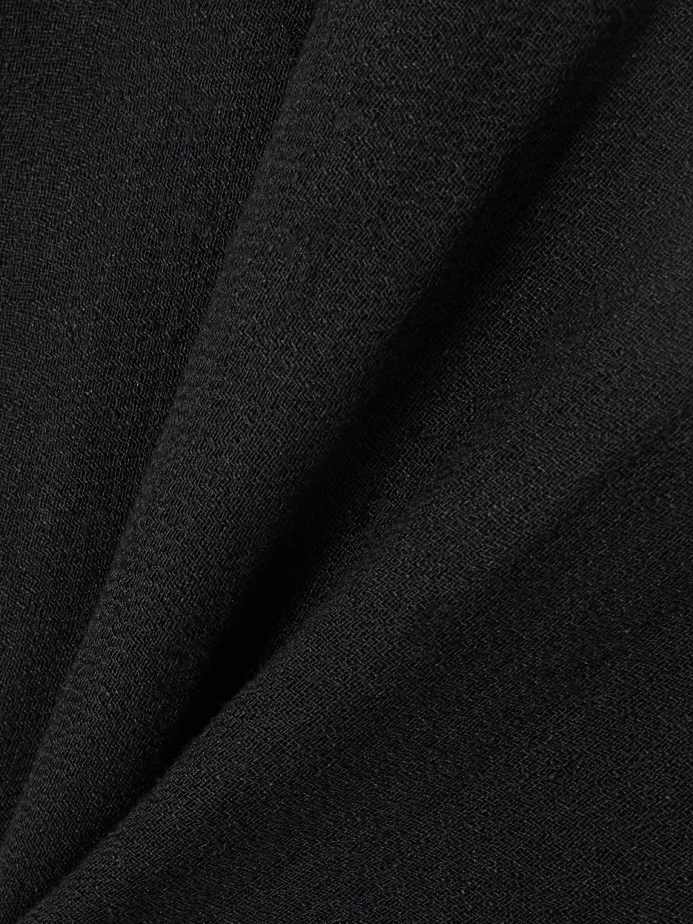 Close-up detail of the Le Kasha Spetses Draped Organic Linen-gauze Mini Skirt