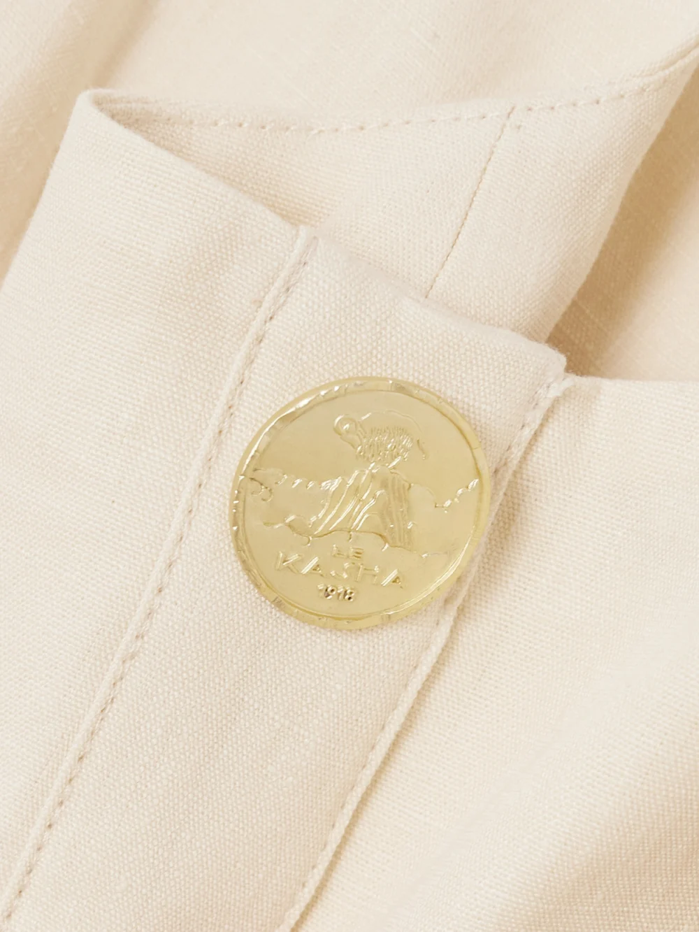 Close-up detail of the Le Kasha Subu Belted Linen Midi Dress