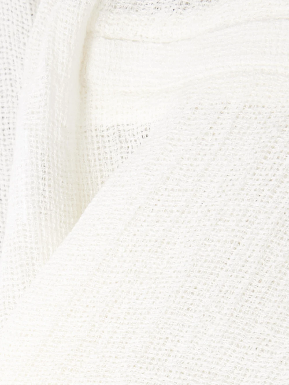 Close-up detail of the Le Kasha Tabag Organic Linen-gauze Shorts