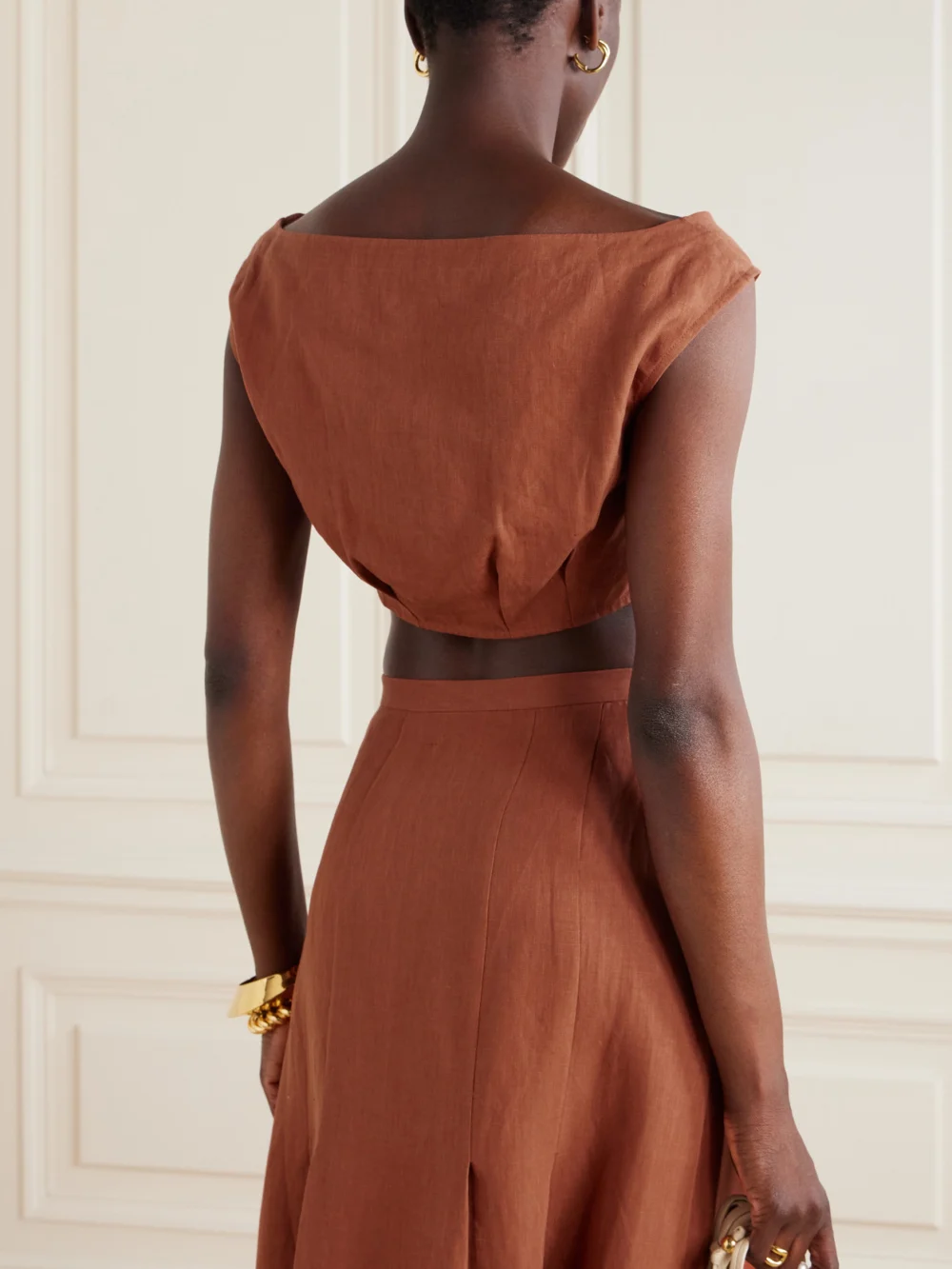 Back view of the Le Kasha Tamra Cropped Organic Linen-gauze Top