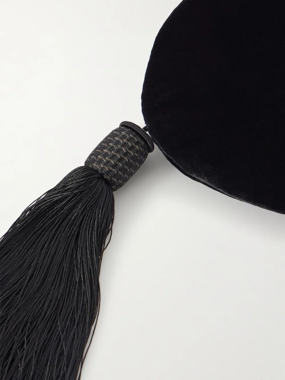 Close-up detail of the Le Sundial Lee Tasseled Velvet Shoulder Bag