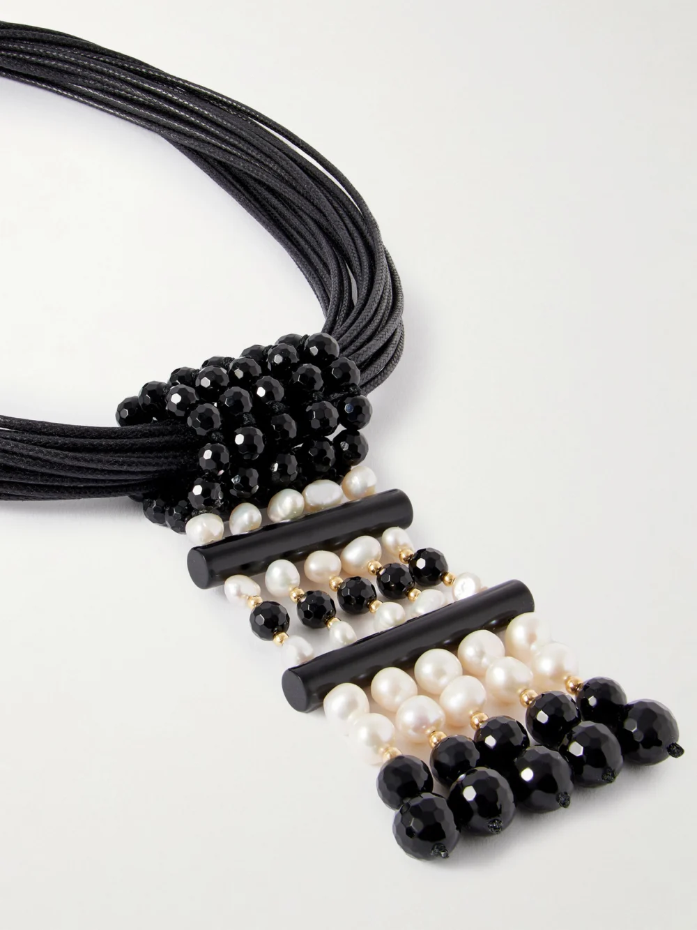 Close-up detail of the Le Sundial Sculptural Pearl, Onyx and 18-karat Gold Cord Necklace