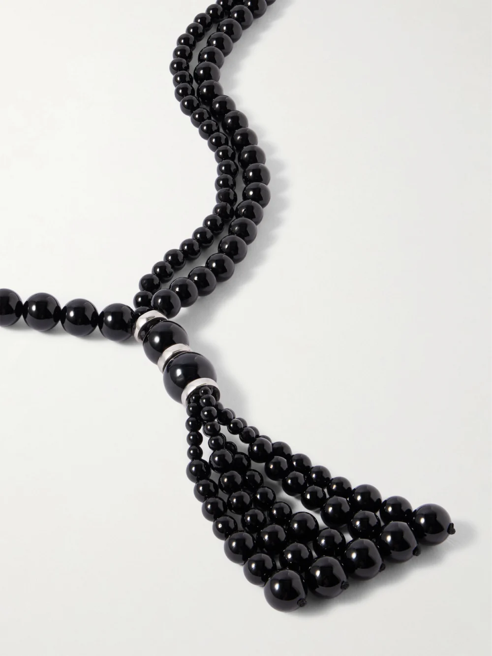 Close-up detail of the Le Sundial Venice Opera Tasseled Onyx and Silver Necklace