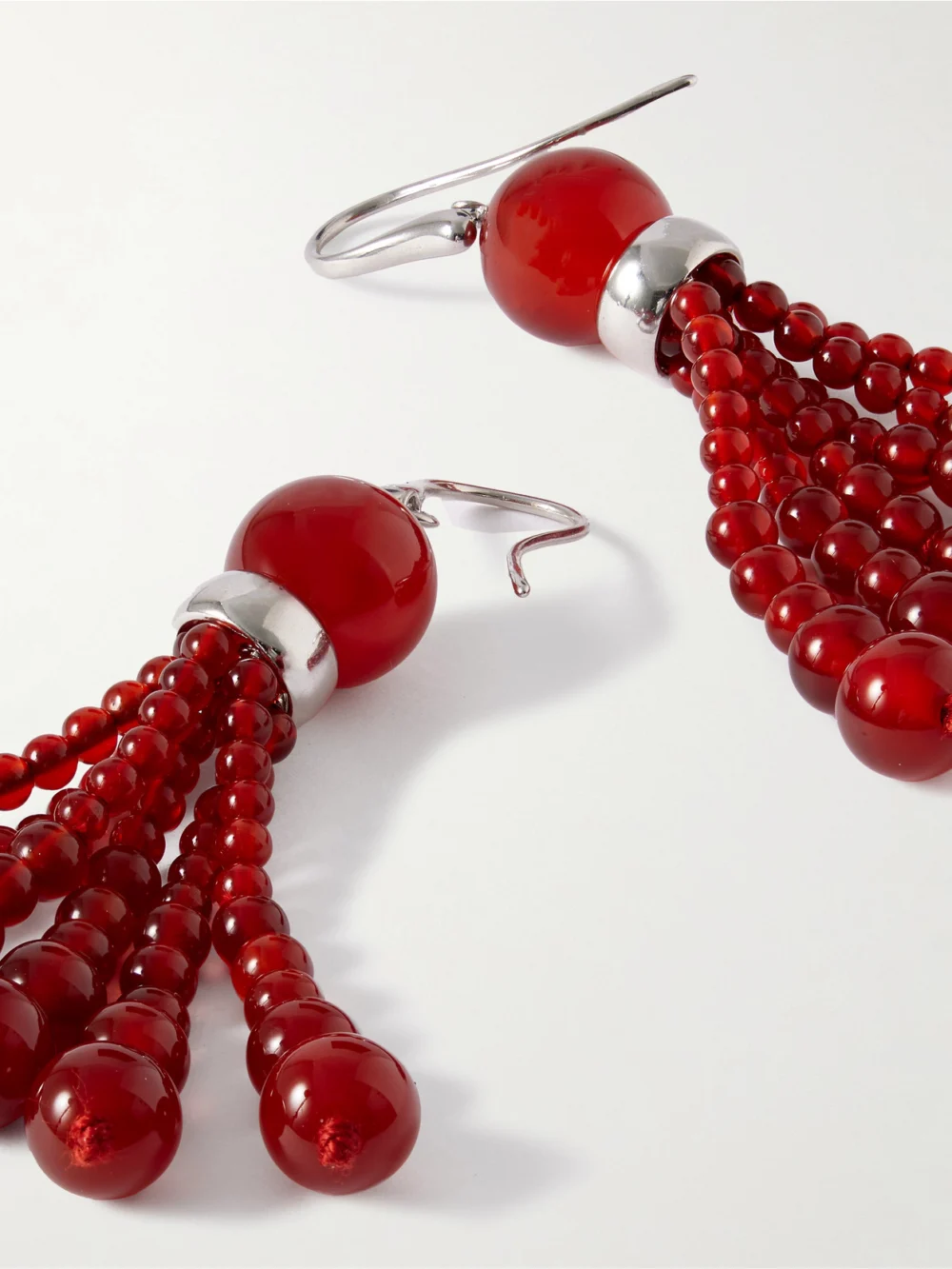 Close-up detail of the Le Sundial Venice Opera Tasselled Carnelian Earrings