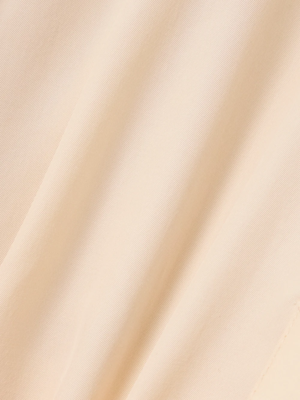Close-up detail of the Lemaire Belted Wool-blend Trench Coat