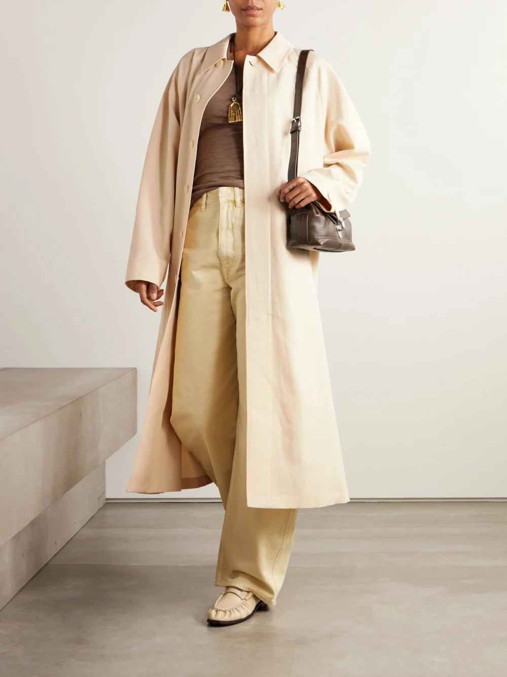 Lemaire Belted Wool-blend Trench Coat, worn by a model
