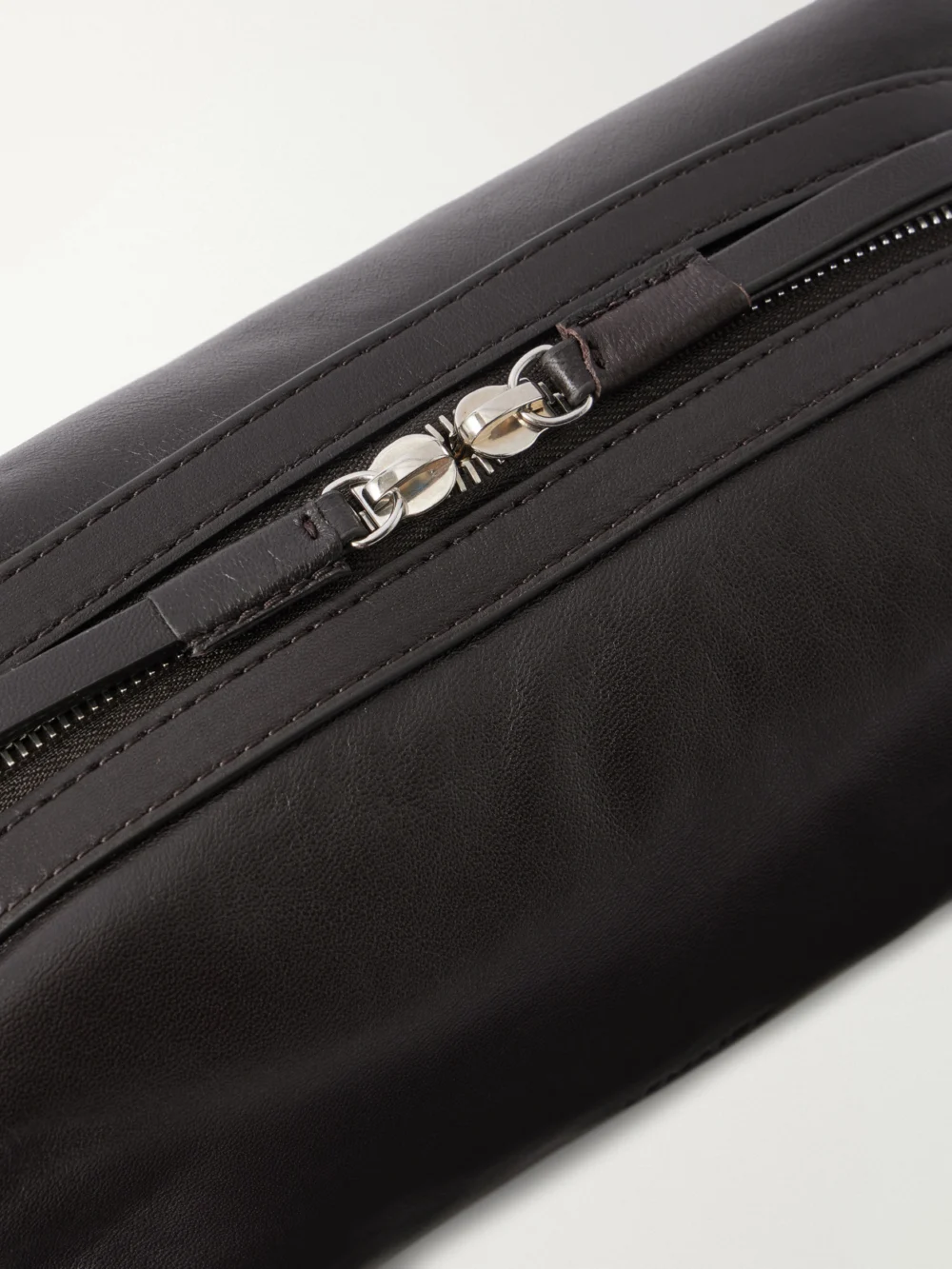 Close-up detail of the Lemaire Care Small Leather Shoulder Bag