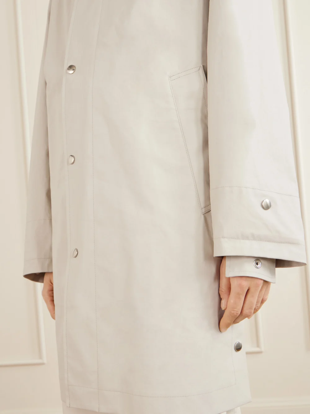 Close-up detail of the Lemaire Coated Cotton-canvas Coat